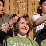 Shaves Red Hair for Cancer